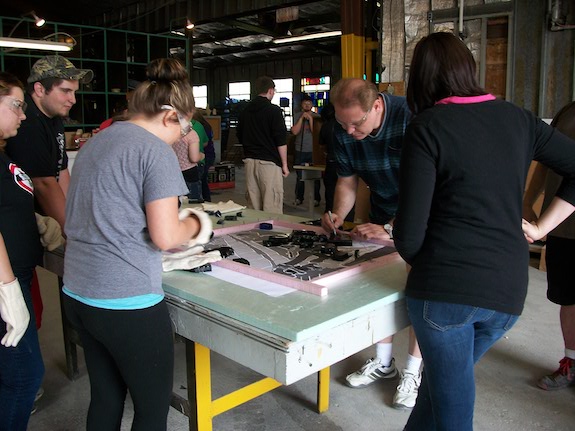 rosie-the-riveter-making-an-glass-display-of-a-Rosie-at-work-on-the-railroad