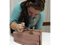 rosie-the-riveter-teen-labeling-blue-bird-house